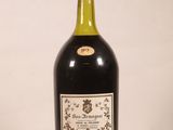a bottle of wine that is sitting on a table