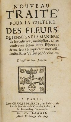 un vieux livre sur lequel figure l'image d'un cheval et d'une calèche