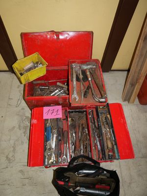 many tools in a red box on the floor