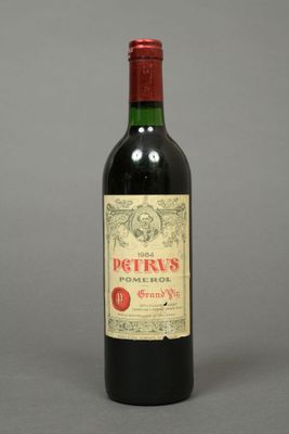 a bottle of wine that is sitting on a table
