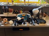 a desk with a lot of clutter on it