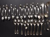 a lot of spoons and spoon spoons on the table
