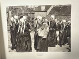a black and white photo of a group of women dressed in traditional clothing