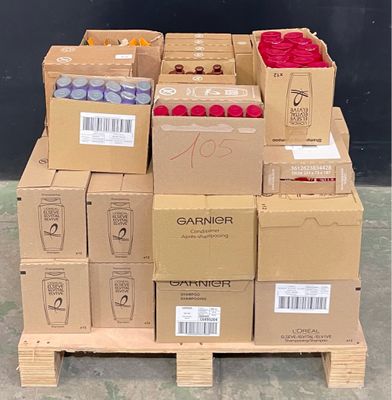 many boxes of fruit on a pallet in a warehouse