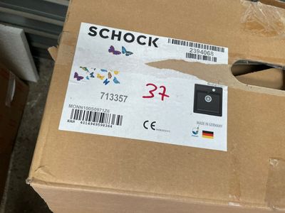 a cardboard box with a sticker on it that says shock