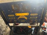a close up of a machine that is sitting on the ground