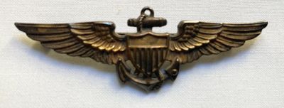an image of a military badge with a bird on it