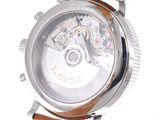 a close up of a watch on a white background