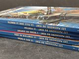 a lot of books that are stacked on top of each other