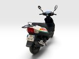 a scooter that is parked on a white surface