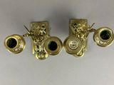 three pairs of gold and green glass earrings