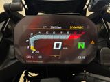a close up of a motorcycle with a speedometer on it