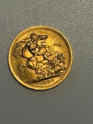 an image of a gold coin with a horse and rider on it
