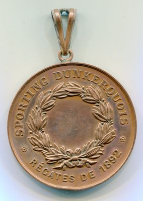 une image représentant une médaille de bronze ornée d'une couronne