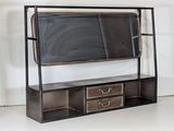a blackboard on a shelf with drawers and a chalkboard