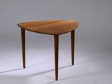 an image of a small table with a wooden top and legs