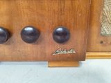 three knobs on the side of the radio