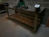 an image of a workbench with a lot of tools on it