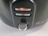 a close up of a toaster on a table