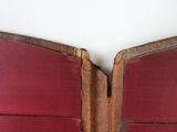 two pieces of wood that have been split in half