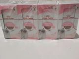 quatre boîtes d'aliments pour chatons Royal Canin posées sur une table