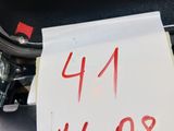 a piece of paper with the number 44 on it in the trunk of a car