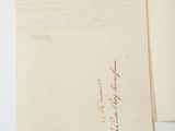 a close up of a piece of paper with writing on it