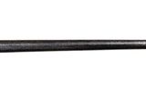 an old photo of a sword with a long blade