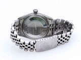 a watch that is sitting on a silver bracelet