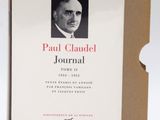 an open book with a picture of a man in a suit and tie