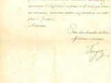 un vieux document écrit posé sur une table
