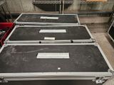 three cases that are sitting on top of each other