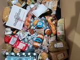 a box full of food that is sitting on the floor