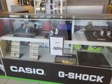 display case of casio g - shock watches for sale in a store