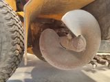 a close up of a wheel on a construction vehicle