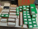 a table with many boxes of electronic equipment on it