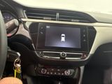 the dashboard of a car with a digital display in the center of it