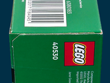 a green box with a white sticker on it