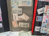 many different types of stamps on a table