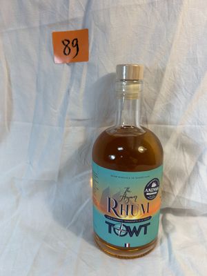 a bottle of rum that is sitting on a table