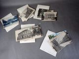 many old photos of buildings and buildings on the table