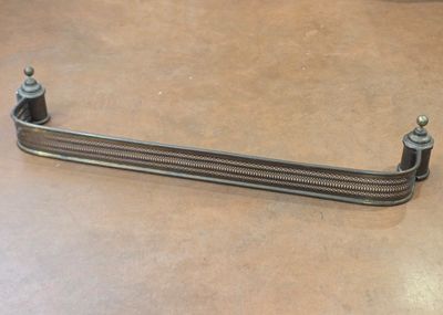 a close up of a metal object on a table in a room