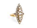 an image of a gold and diamond cluster ring