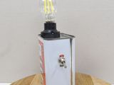 a light that is sitting on top of a wooden table