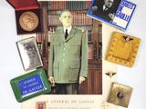 a picture of a man in a military uniform surrounded by other items