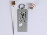 a small metal object with a small metal object on it