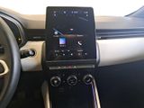 a car dashboard with a cell phone in the center of it