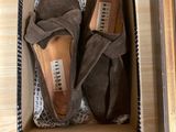 pair of women ' s shoes in a box on a table