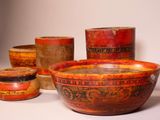 many bowls and containers that are sitting on a table