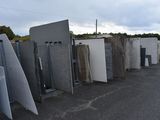 a lot of different types of doors in a parking lot